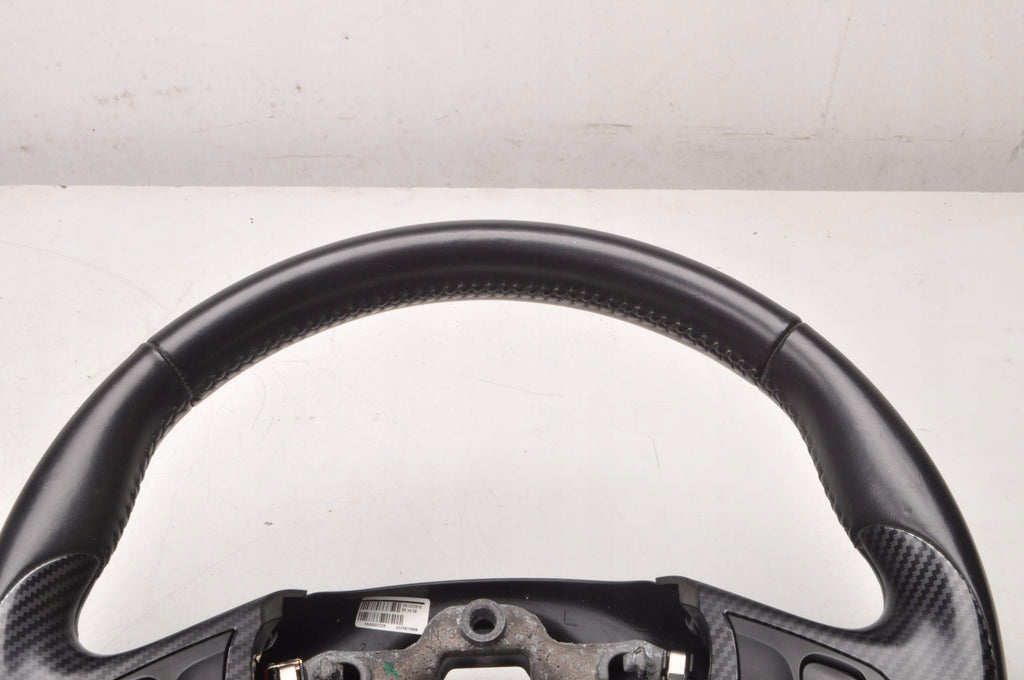 RENAULT CAPTURING AND MULTIFUNCTION LEATHER STEERING WHEEL