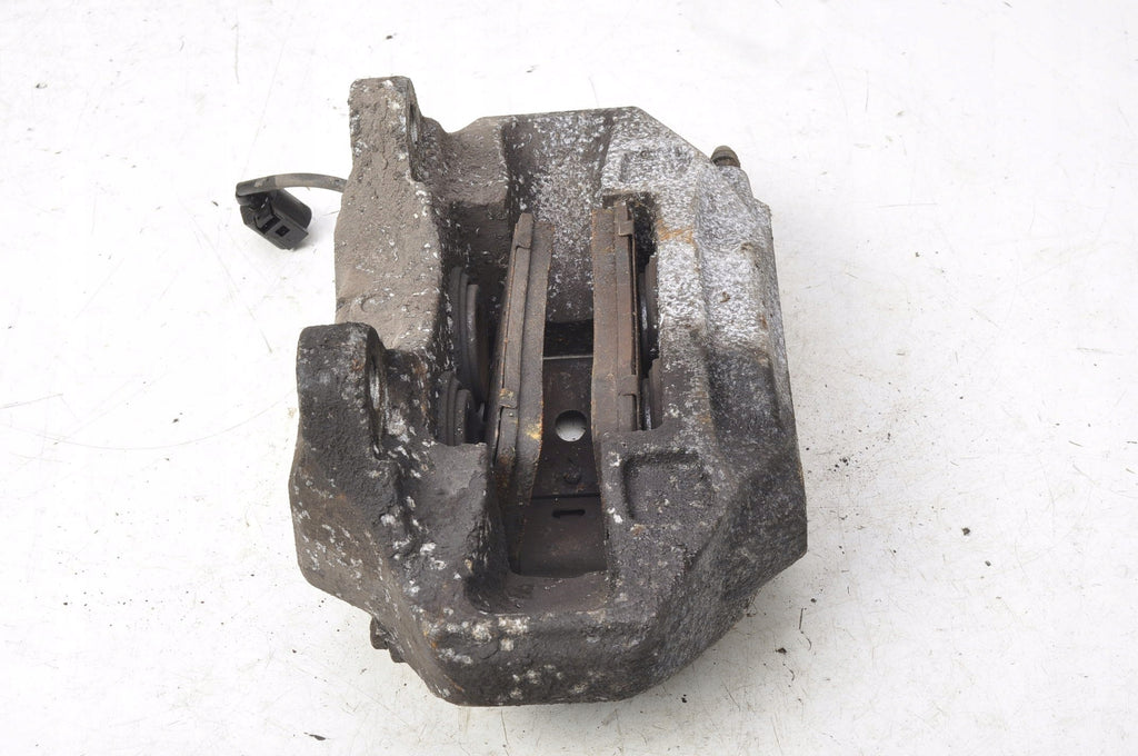 VOLKSWAGEN TOUAREG AND BRAKE CALIPER RIGHT FRONT