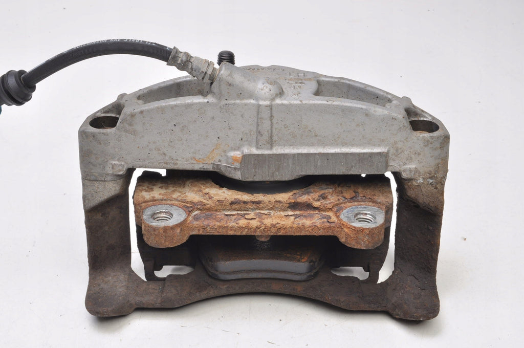 VOLVO XC70 II 2.4 D5 BRAKE CALIPER LEFT FRONT