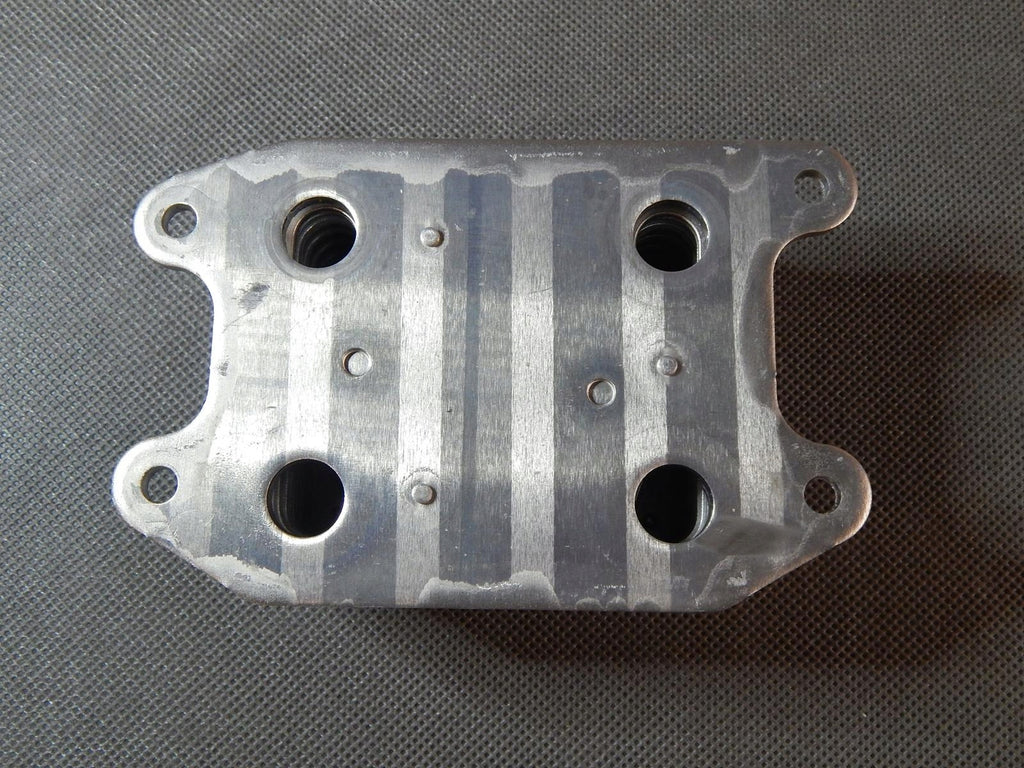 VW GOLF VII OIL COOLER 04E117021L